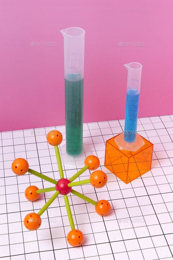 Laboratory workbench with a variety of colorful chemistry objects on a ...