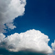 White puffy clouds on blue sky - PhotoDune Item for Sale