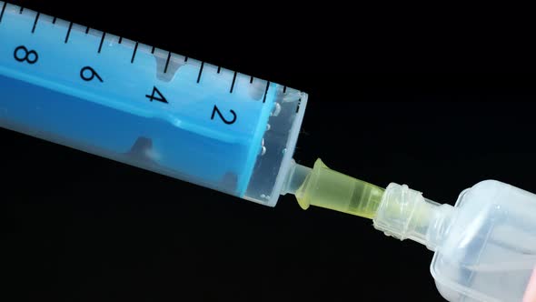 Plastic medical syringe with needle and plastic vial. Medical injection concept