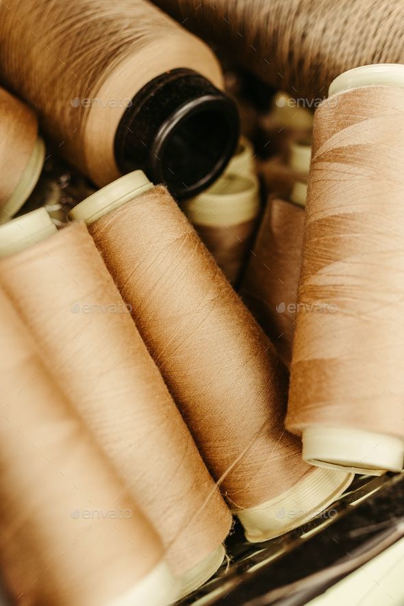 Premium Photo  Closeup there are lots of colorful spools of