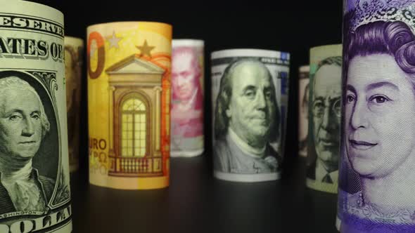 Foreign currency money exchange concept. Many banknotes of different nations. alt