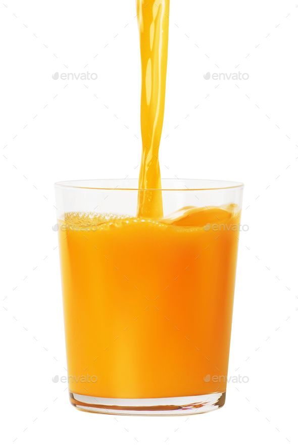 Pitcher filled with freshly-squeezed orange juice being poured into a clear  glass Stock Photo by wirestock