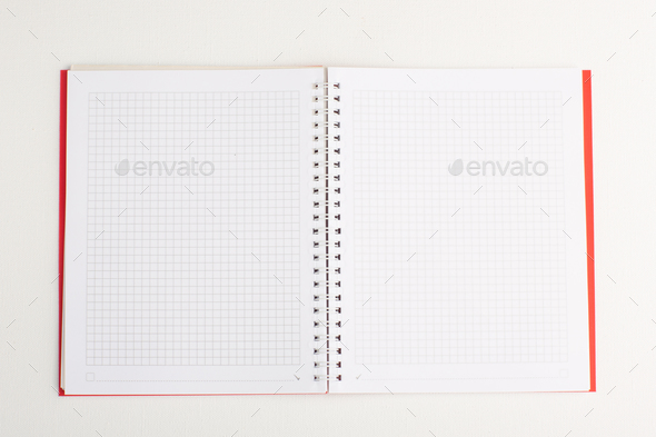 top view open copybook on the white background school learning study pen notepad