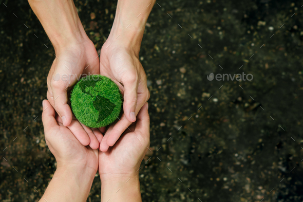 Net Zero and Carbon Neutral Concepts.Hands holding the earth to protect nature Save for sustainable.
