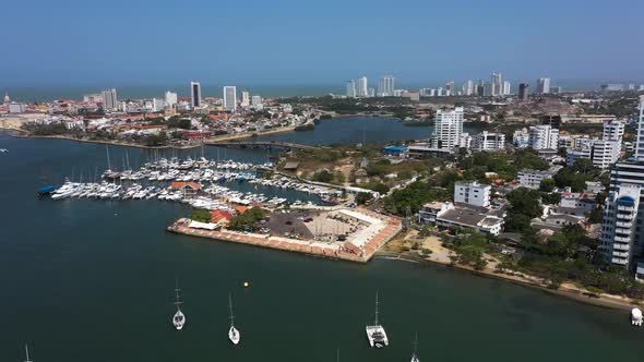 Anchorage of Yachts on the Shore of the Bay in a Modern Metropolis alt
