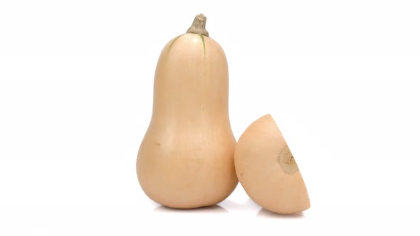 Butternut Squash and half Butternut Squash rotation isolated on white background, Close up alt