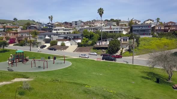 Slow motion empty playground during Corona pandemic.Gorgeous aerial view flight fly forwards drone alt