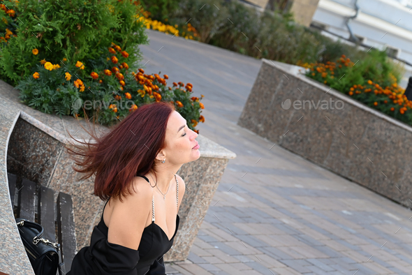 Details Of Womens Clothes And Shoes On A Street Stock Photo