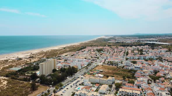 Aerial View Of Altura Town In South Coast Of Portugal - drone descend alt