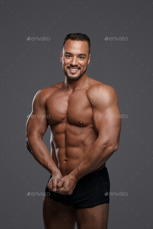 Handsome and muscular male model with a chiseled physique Stock