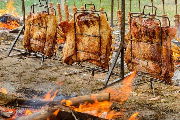 Barbecue ribs on the ground fire. Typical Brazilian barbecue Stock ...