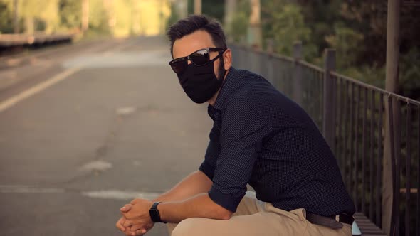 Businessman In Face Mask Protection Epidemic Coronavirus On Train Station. Man In Face Mask. alt