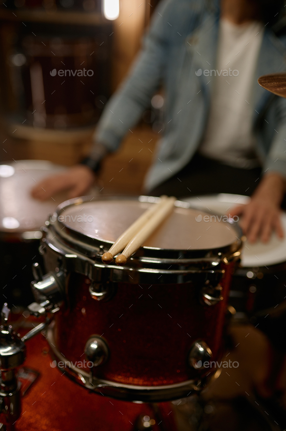 Drum kit beat set percussion instrument with focus on drumstick