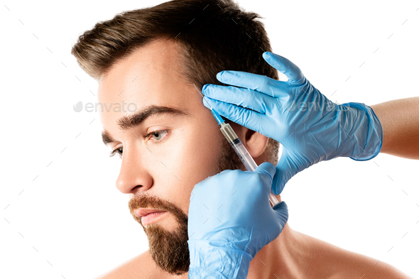 Man receiving scalp injection for hair grow