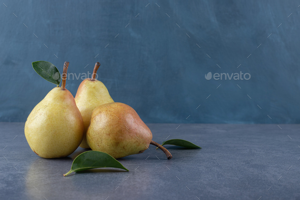 Fresh organic pears on a white background