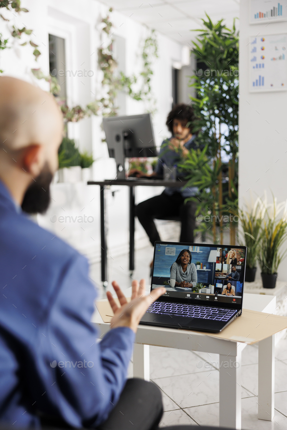 Executive in startup company leading virtual meeting