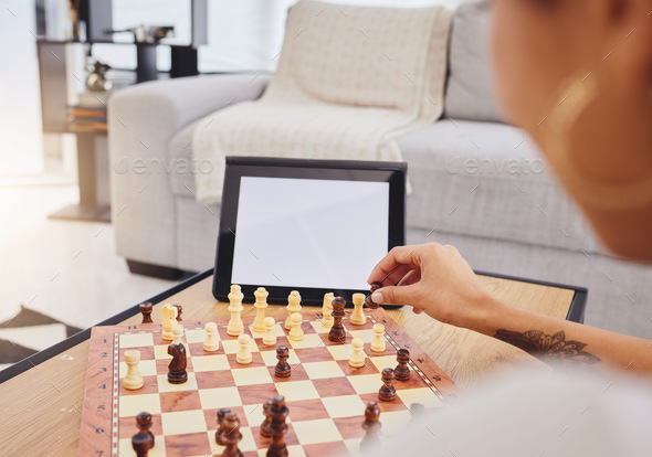 Video call, chess and woman with tablet, mockup and screen in gaming connection in living room. Thi