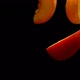Closeup of the Fresh Peach Slices Flying Diagonally on the Black Background - VideoHive Item for Sale