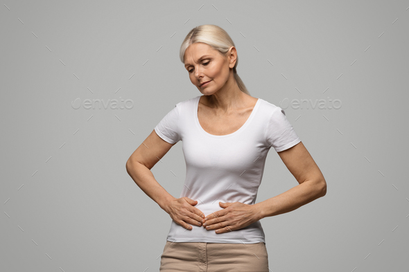 Stomach Pain Sick Mature Woman Suffering From Acute Abdominal Ache Stock Photo By Prostock Studio