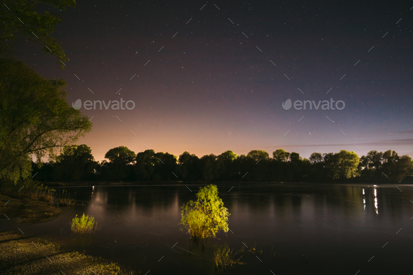 Starry Night Sky Above River. Concept Of Meditation. Calmness And Serenity. Calm Night. Clear Starry