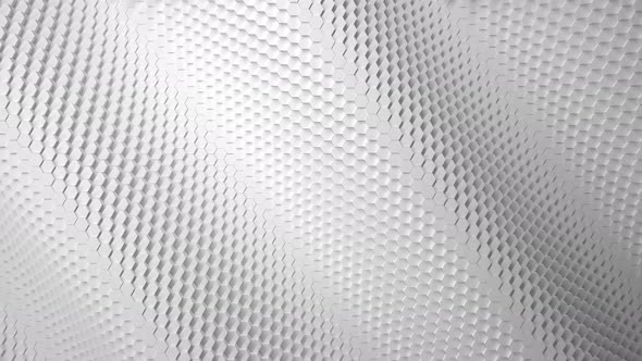 Wave motion mosaic surface with moving white hexagons.