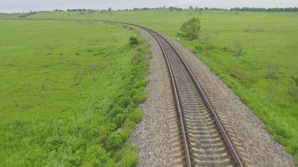 Empty Straight Oneway Railways on a Summer Sunny Day alt