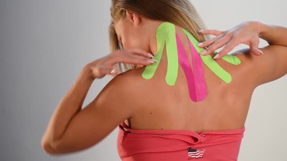 Kinesio Tape on Girl Back alt