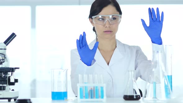 Scientist  imaginating New idea in Laboratory, Research Work alt
