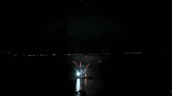 huge firework show on the sea alt