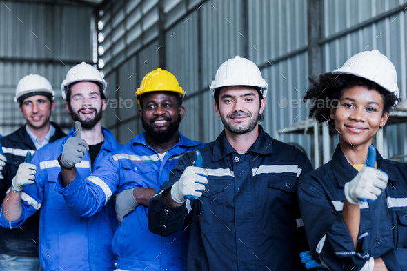 Portrait confident workers, mechanical engineer team and teamwork of workers working in industry
