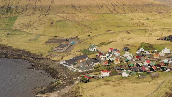 Drone Over Village By Sorvagsvatn Or Leitisvatn Lake alt
