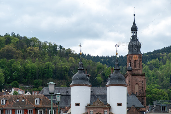 Germany, Heidelberg city. Upper view of two white Tower and of Holy Ghost Roman Catholic Church.