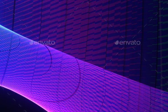 Large display featuring a pattern of purple and blue lights radiating outward along distinct lines