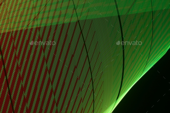 Large display featuring a pattern of green lights radiating outward along distinct lines