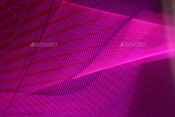 Large display featuring a pattern of pink lights radiating outward along distinct lines