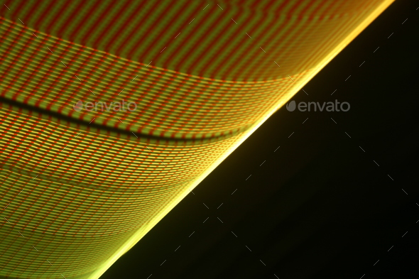 Large display featuring a pattern of red and yellow lights radiating outward along distinct lines