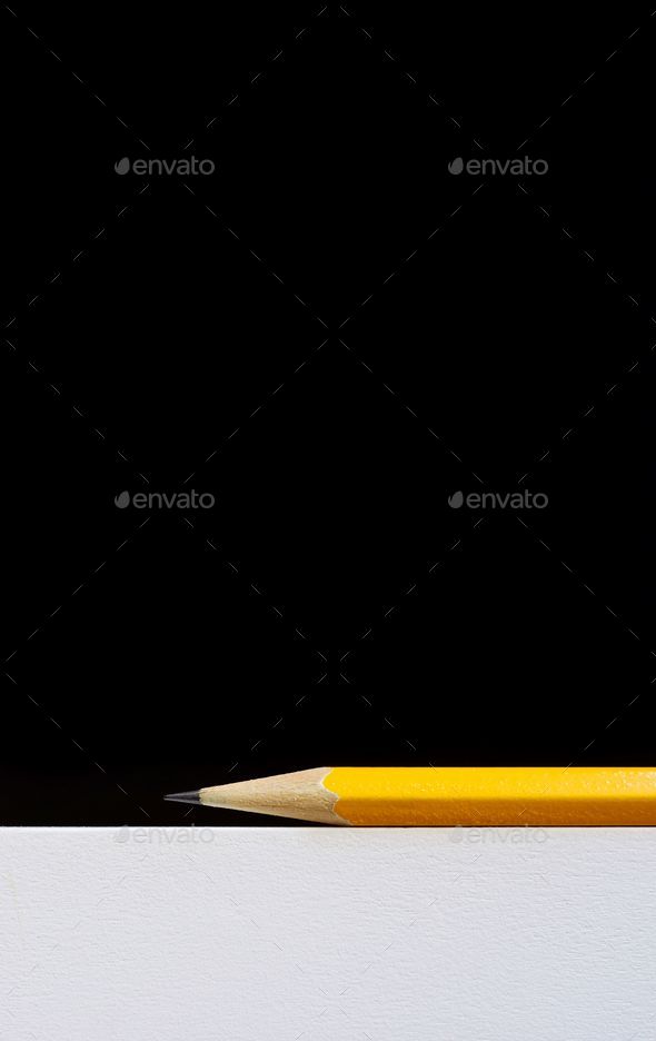 yellow pencil black background