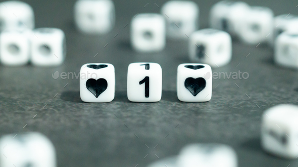 number 1 one in white letter block beads. First anniversary. Marriage anniversary concept