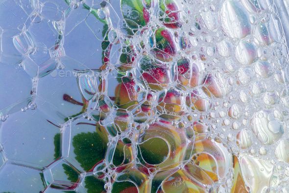 Closeup shot of details on many clear soap bubbles