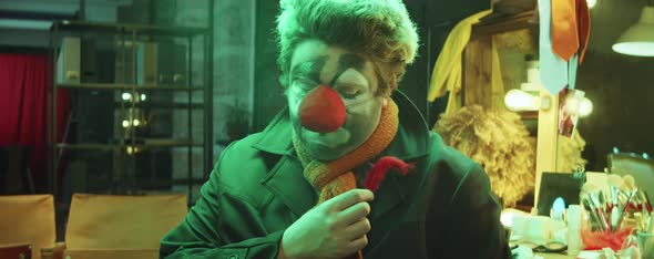 Portrait of Clown with Red Feather alt