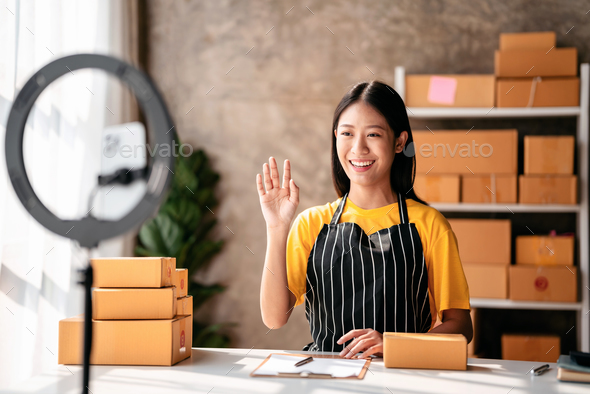 Small business parcel delivery concept, Female entrepreneur live