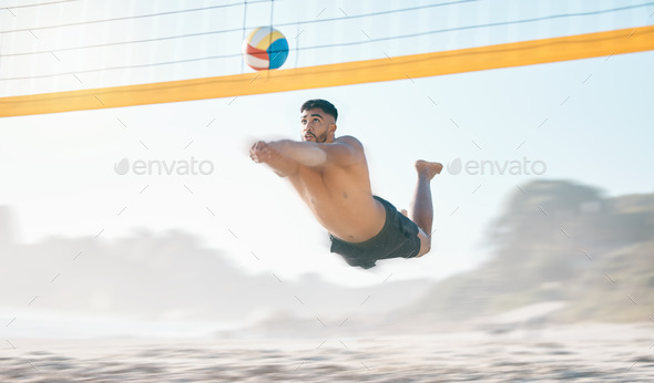 Volleyball, diving and man jump at beach in air for fun competition, contest and motion blur. Male