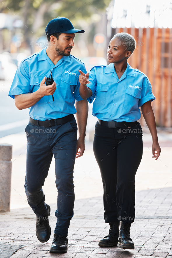 Security guard, safety officer and team walking on street for protection, patrol or watch. Law enfo
