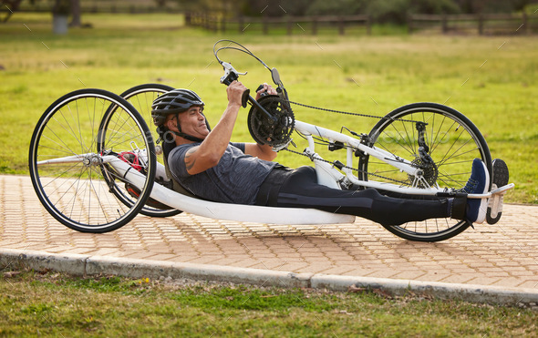 Cycling, disability and fitness with man and bike with handicap for training, sports and challenge.