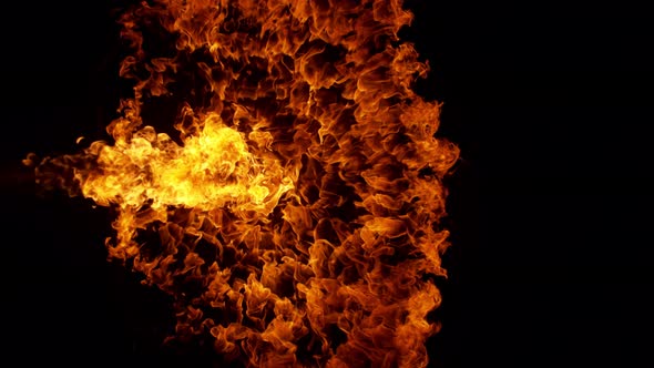 Super Slow Motion Shot of Fire Explosion Against the Black Wall at 1000Fps. alt