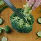 Close Up Knife Cutting Fresh Green Broccoli - VideoHive Item for Sale