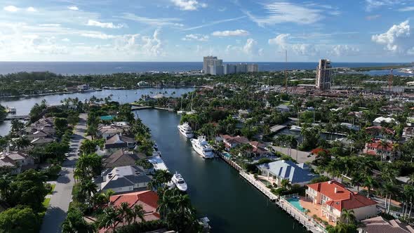 Aerial view over Harbor Beach flying towards the ocean in Florida alt