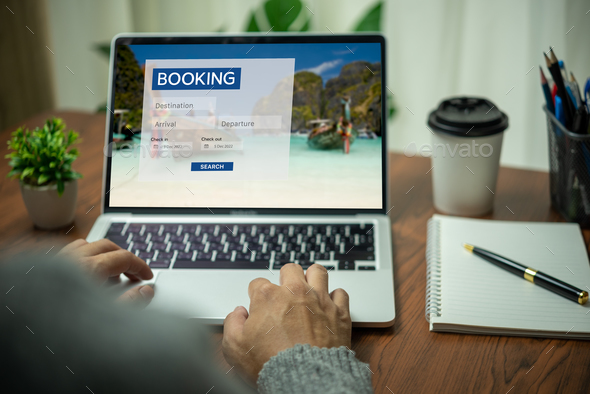 Online booking platform on a laptop computer by a person