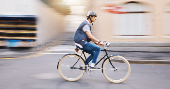 Student man, bike and city in motion blur, speed and sustainable travel in street for fitness in su