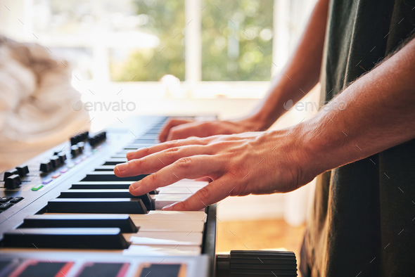Piano, man and hands on keys for music, creative talent and skills in home studio. Closeup, musicia